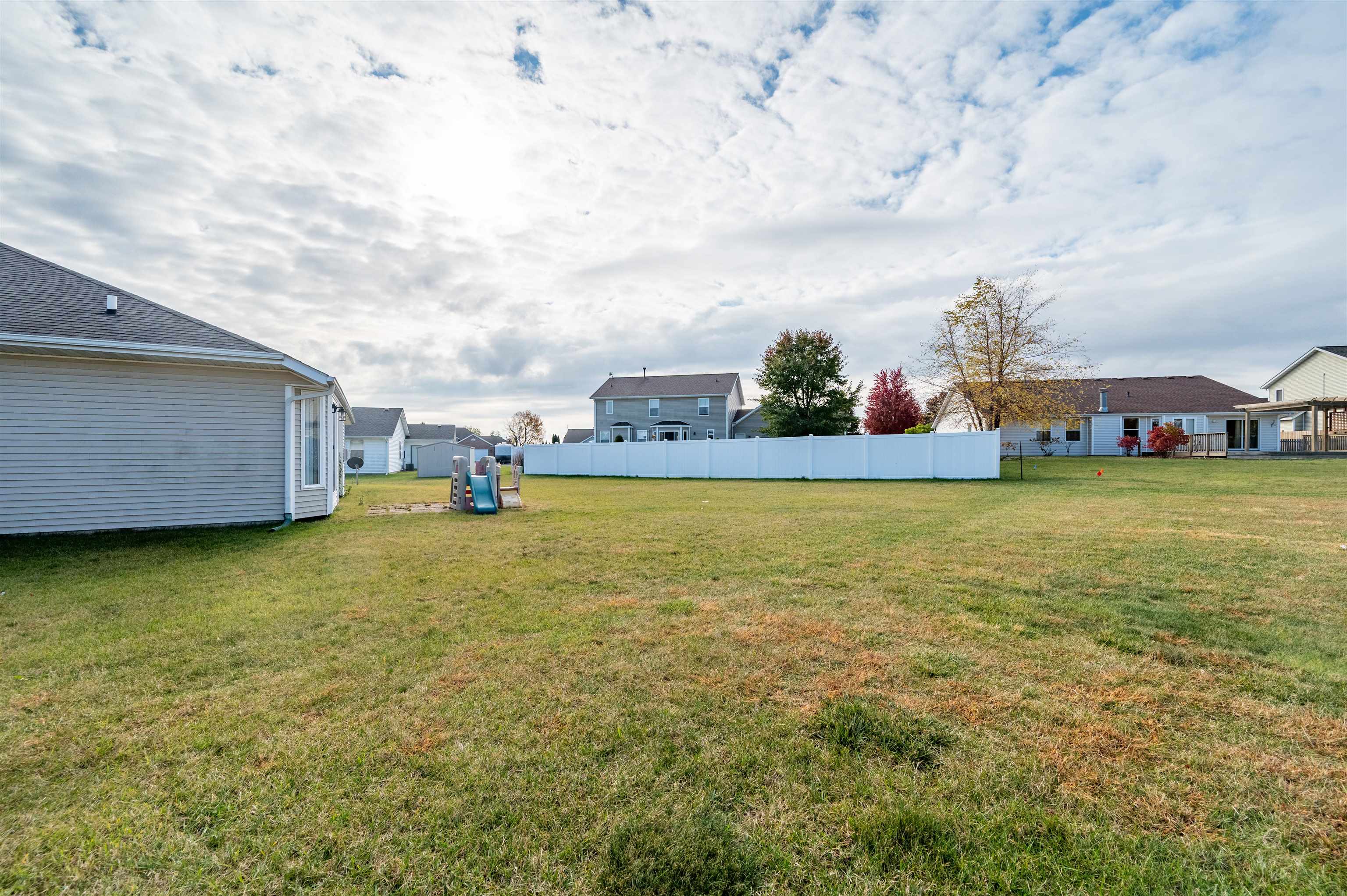 726 Golden Prairie Drive Davis Junction, IL 61020 - Photo 27 of 29 a view of a street with houses