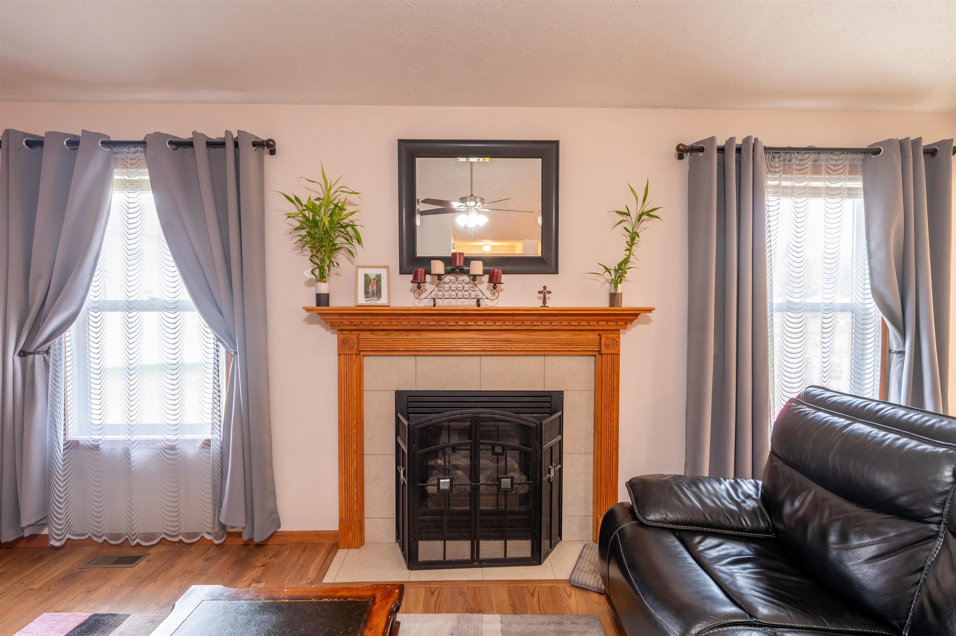 726 Golden Prairie Drive Davis Junction, IL 61020 - Photo 6 of 29 a living room with furniture and a fireplace