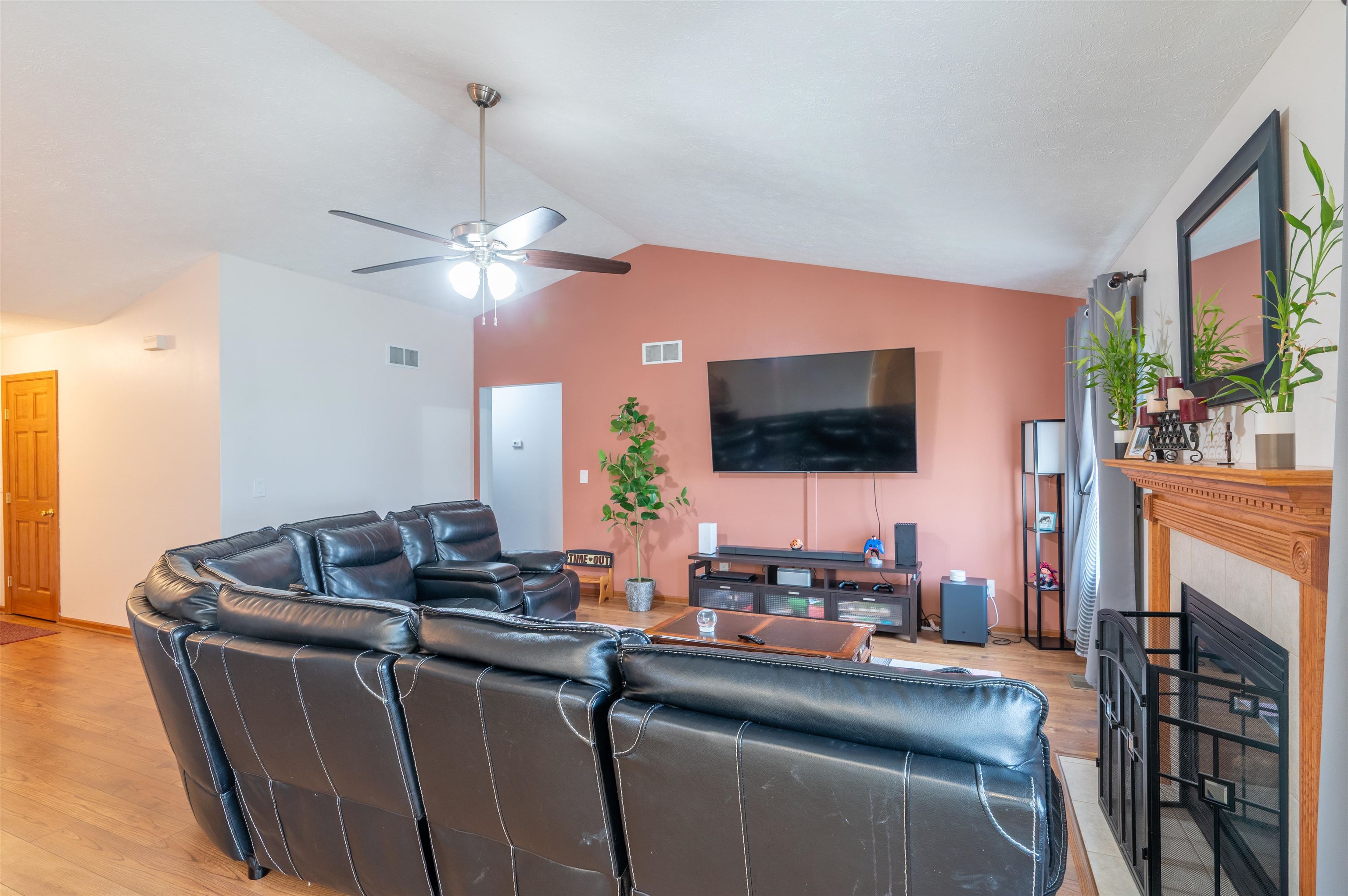 726 Golden Prairie Drive Davis Junction, IL 61020 - Photo 7 of 29 a living room with furniture and a flat screen tv