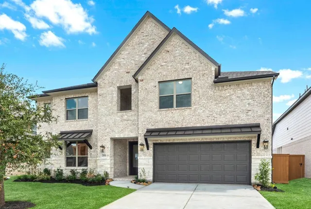 a view of house with yard