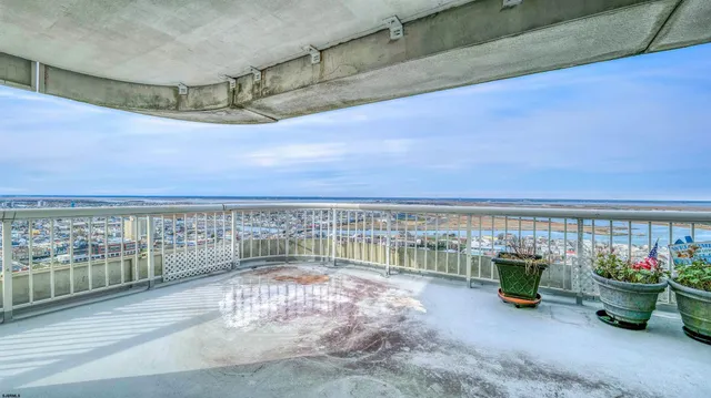 a view of a balcony with city view