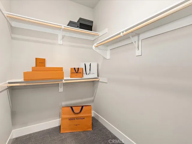 a bathroom with a shower sink and mirror