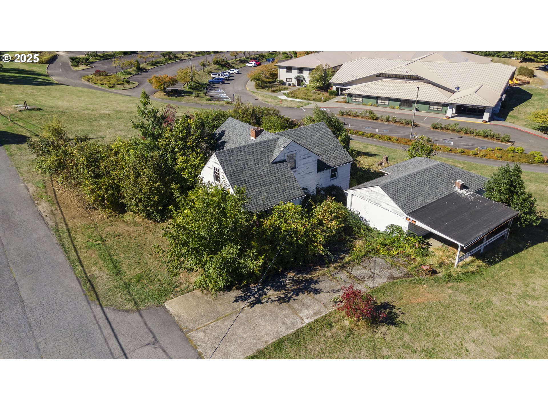 2119 Southwest Nevada Court Portland, OR 97219 - Photo 15 of 15 a black and white photo of a house