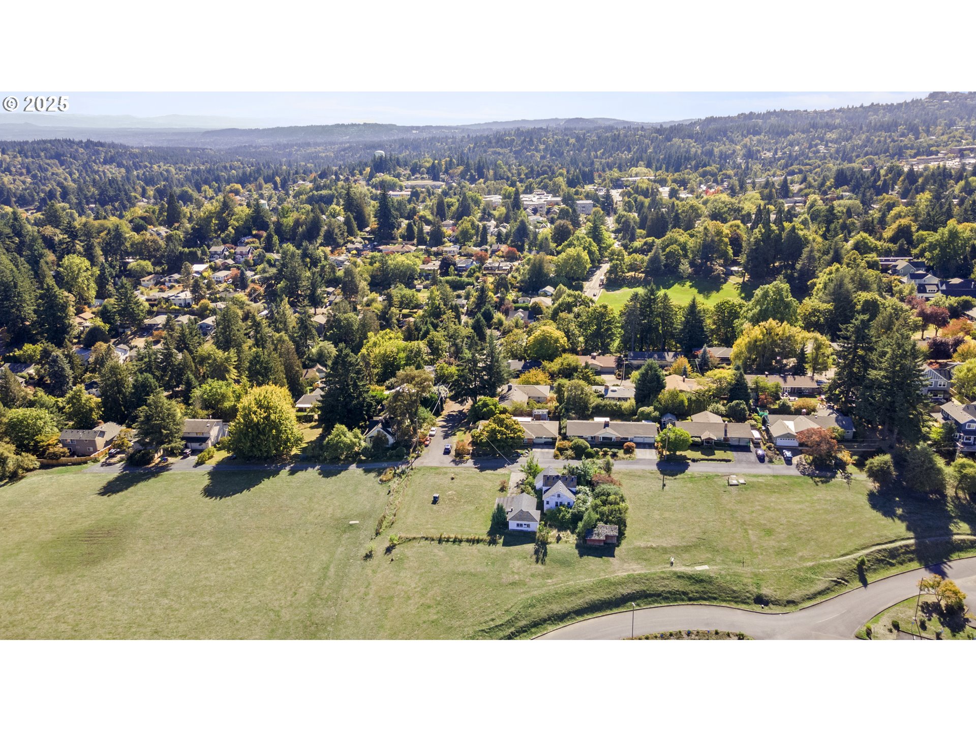 2119 Southwest Nevada Court Portland, OR 97219 - Photo 6 of 15 an aerial view of a house with a yard