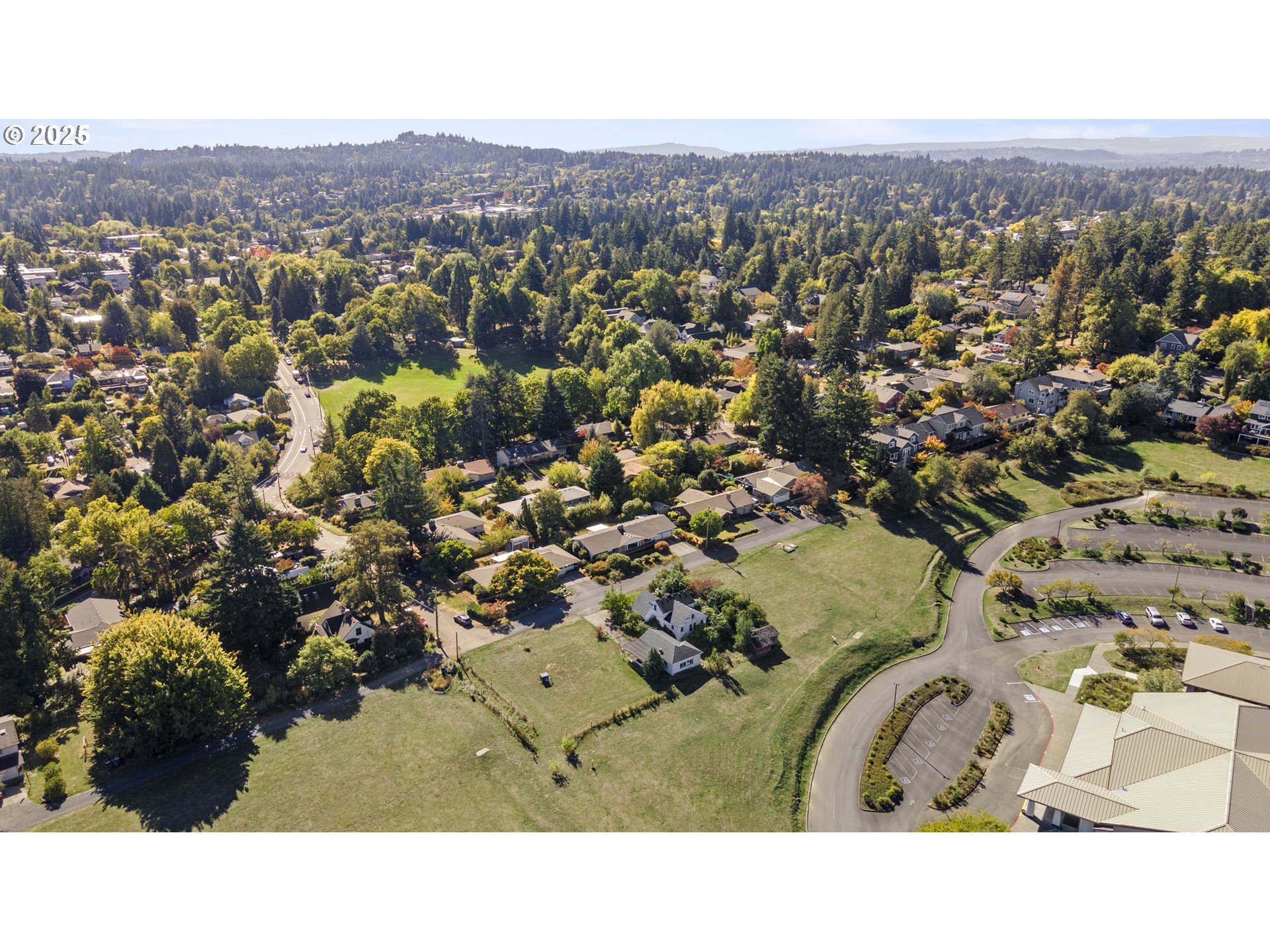 2119 Southwest Nevada Court Portland, OR 97219 - Photo 7 of 15 an aerial view of a house with a yard