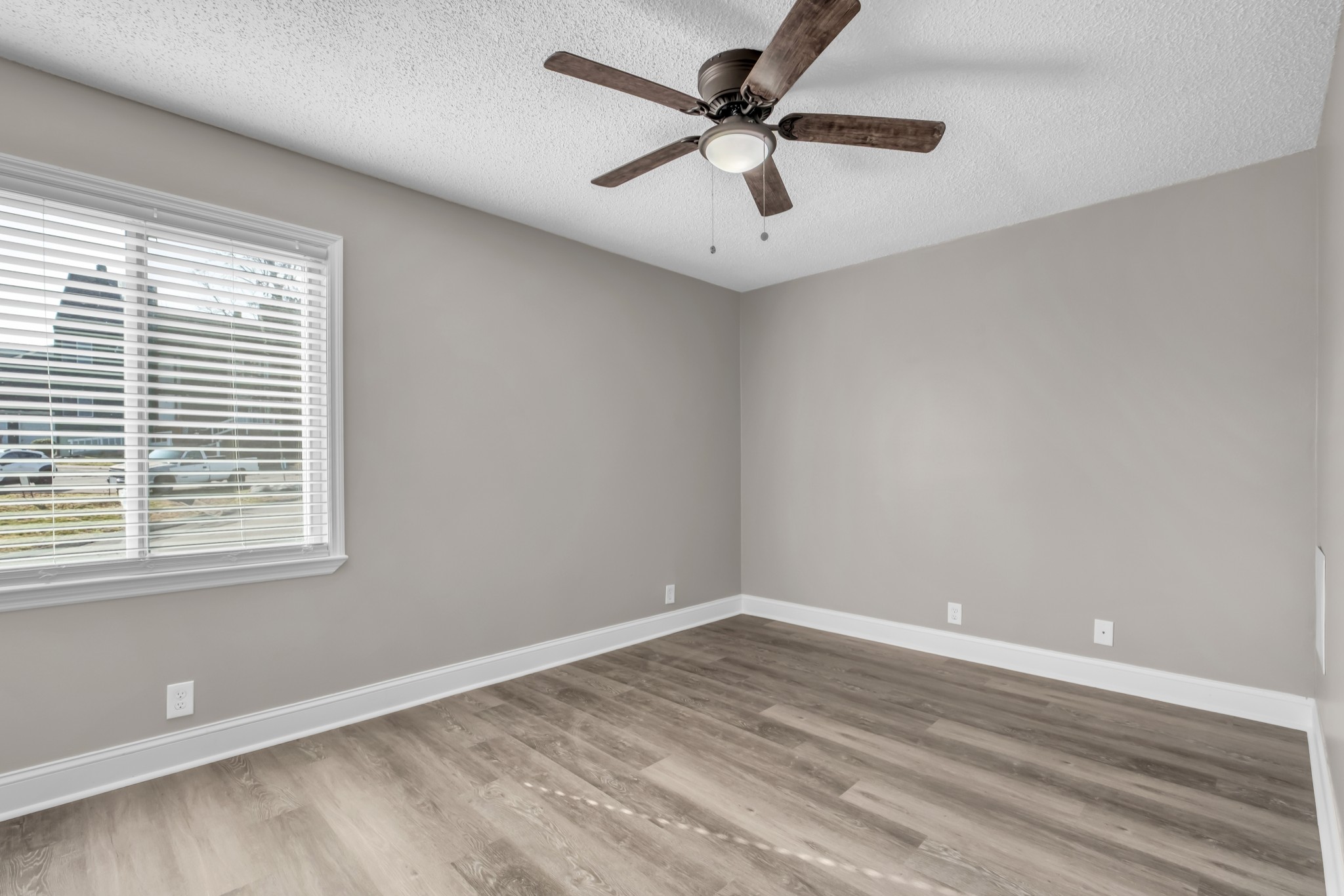 403 Raintree Drive Hermitage, TN 37076 - Photo 14 of 22 an empty room with a window and a fan