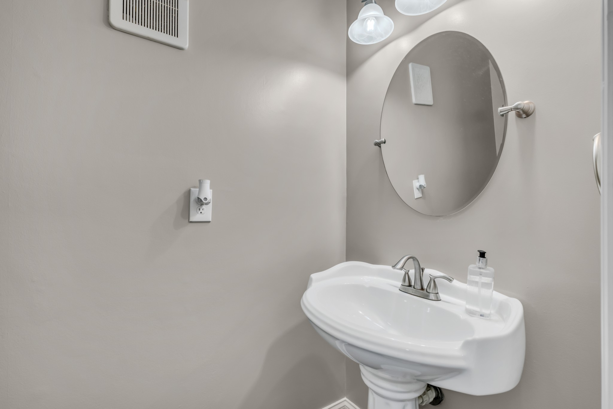 403 Raintree Drive Hermitage, TN 37076 - Photo 17 of 22 a bathroom with a sink and a mirror