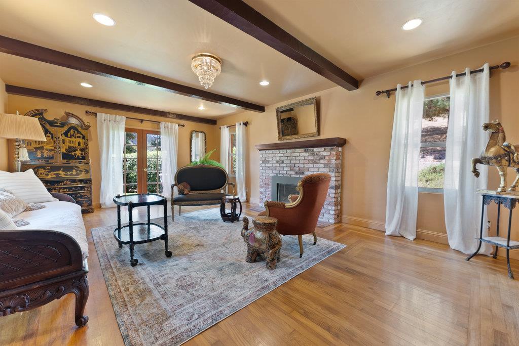 2970 Freedom Boulevard Watsonville, CA 95076 - Photo 12 of 58 a living room with furniture and a fireplace