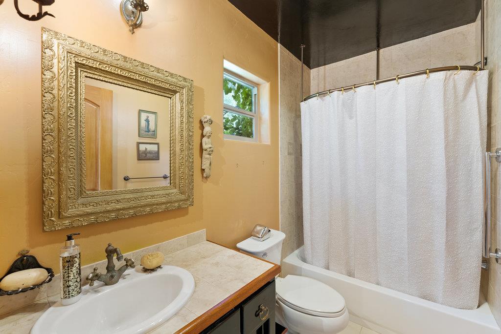 2970 Freedom Boulevard Watsonville, CA 95076 - Photo 18 of 58 a bathroom with a sink a toilet and shower