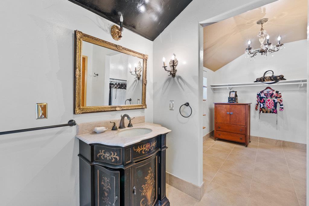 2970 Freedom Boulevard Watsonville, CA 95076 - Photo 23 of 58 a bathroom with a sink and a mirror