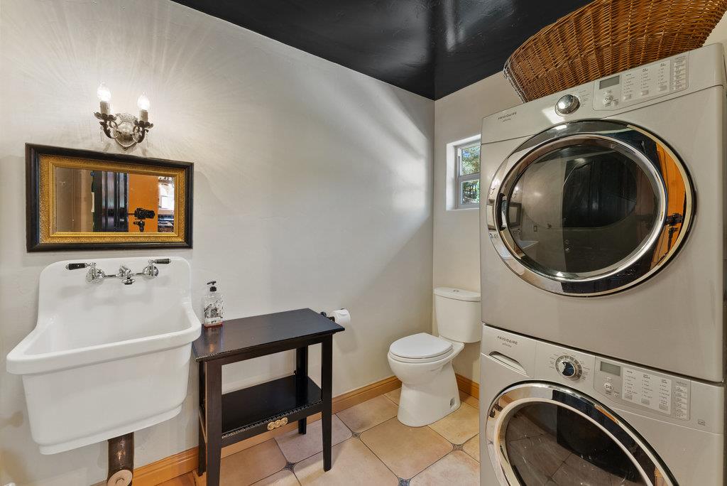 2970 Freedom Boulevard Watsonville, CA 95076 - Photo 30 of 58 a bathroom with a sink a mirror and toilet