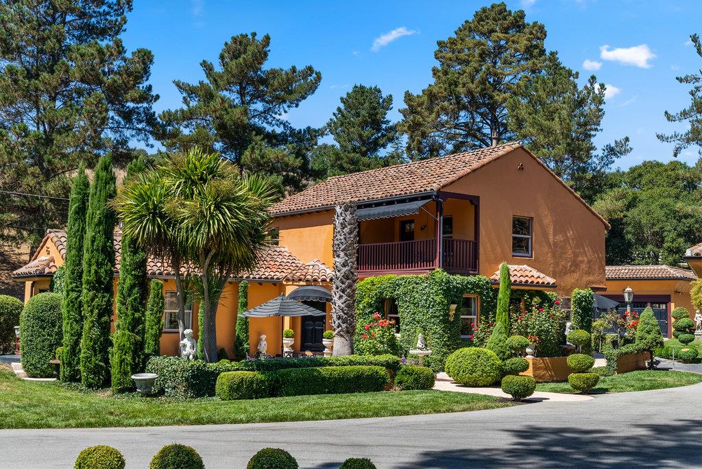 2970 Freedom Boulevard Watsonville, CA 95076 - Photo 45 of 58 a front view of a house with a yard and potted plants