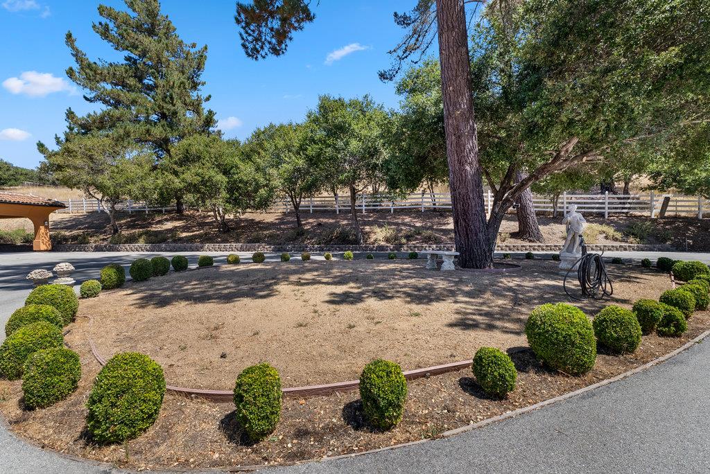2970 Freedom Boulevard Watsonville, CA 95076 - Photo 55 of 58 a view of a garden with a bench