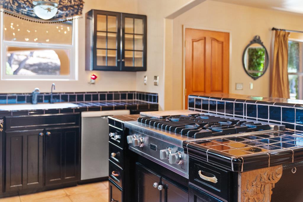 2970 Freedom Boulevard Watsonville, CA 95076 - Photo 7 of 58 a kitchen with a stove and a microwave