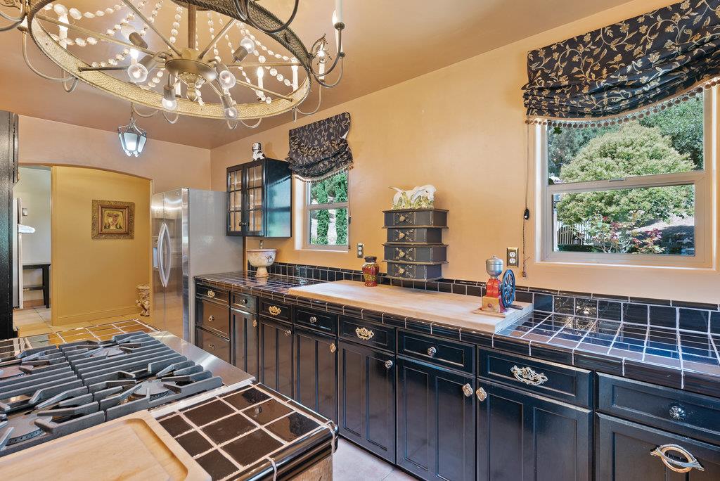 2970 Freedom Boulevard Watsonville, CA 95076 - Photo 8 of 58 a kitchen with stainless steel appliances a sink stove and cabinets