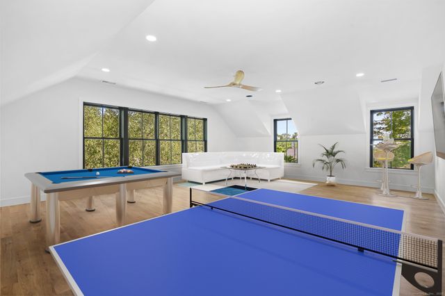a kitchen with sink cabinets and dining table