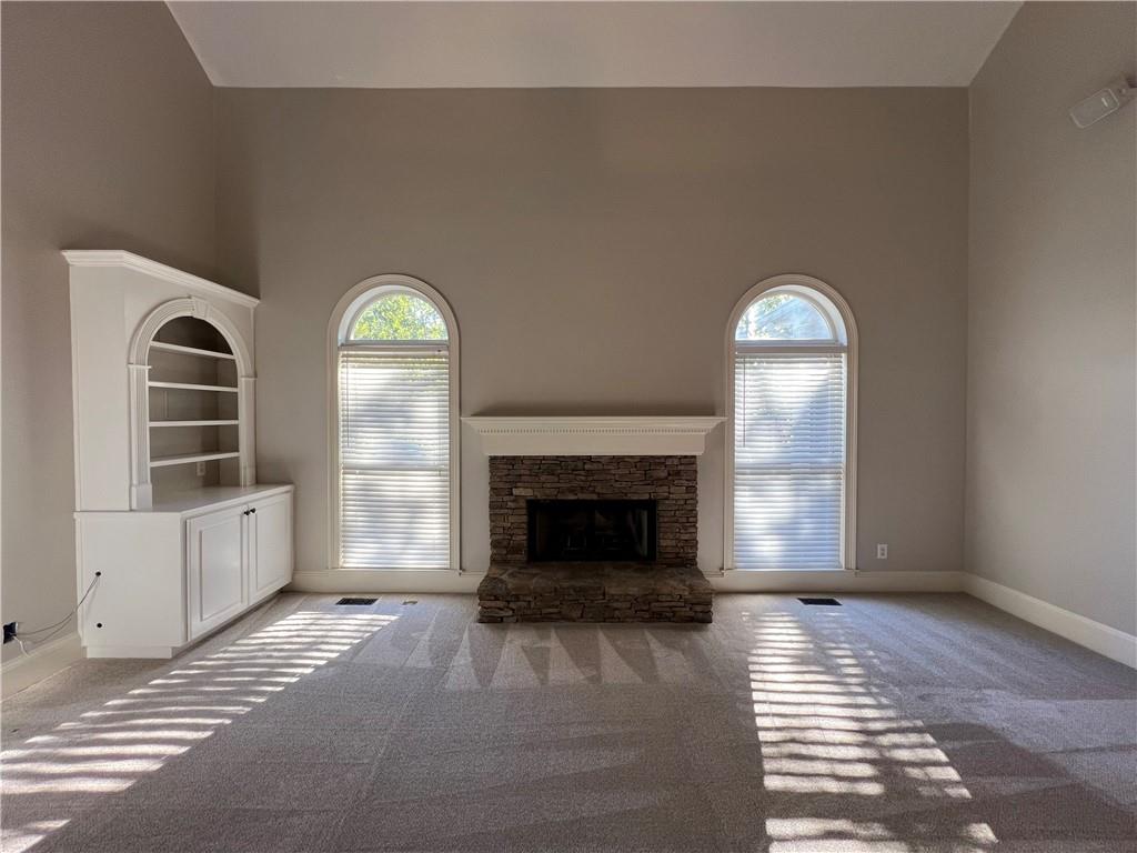 Undisclosed Address Kennesaw, GA 30144 - Photo 19 of 51 a view of livingroom with furniture and fireplace