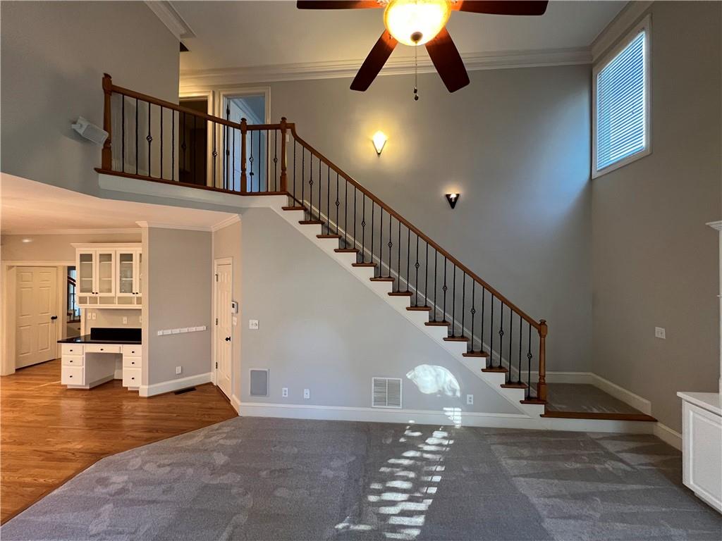 Undisclosed Address Kennesaw, GA 30144 - Photo 20 of 51 a view of entryway and hall with wooden floor