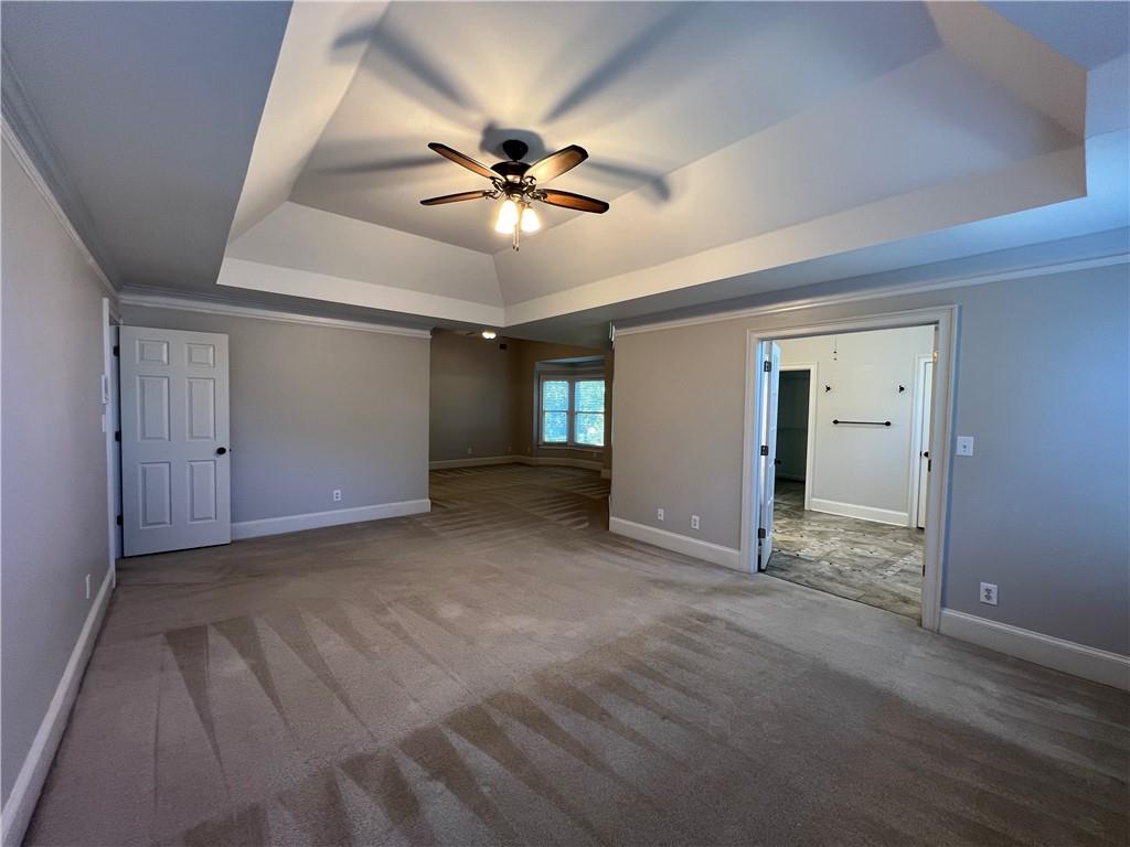 Undisclosed Address Kennesaw, GA 30144 - Photo 21 of 51 a view of a livingroom with a ceiling fan