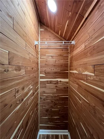 a room with a sink and cabinets