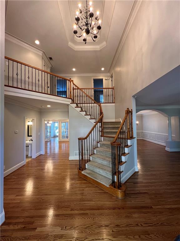 Undisclosed Address Kennesaw, GA 30144 - Photo 3 of 51 a view of entryway and hall with wooden floor