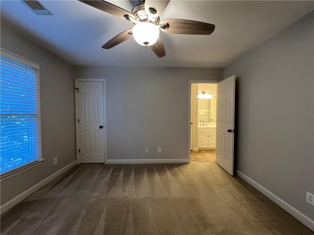 Undisclosed Address Kennesaw, GA 30144 - Photo 33 of 51 wooden floor in an empty room with a window