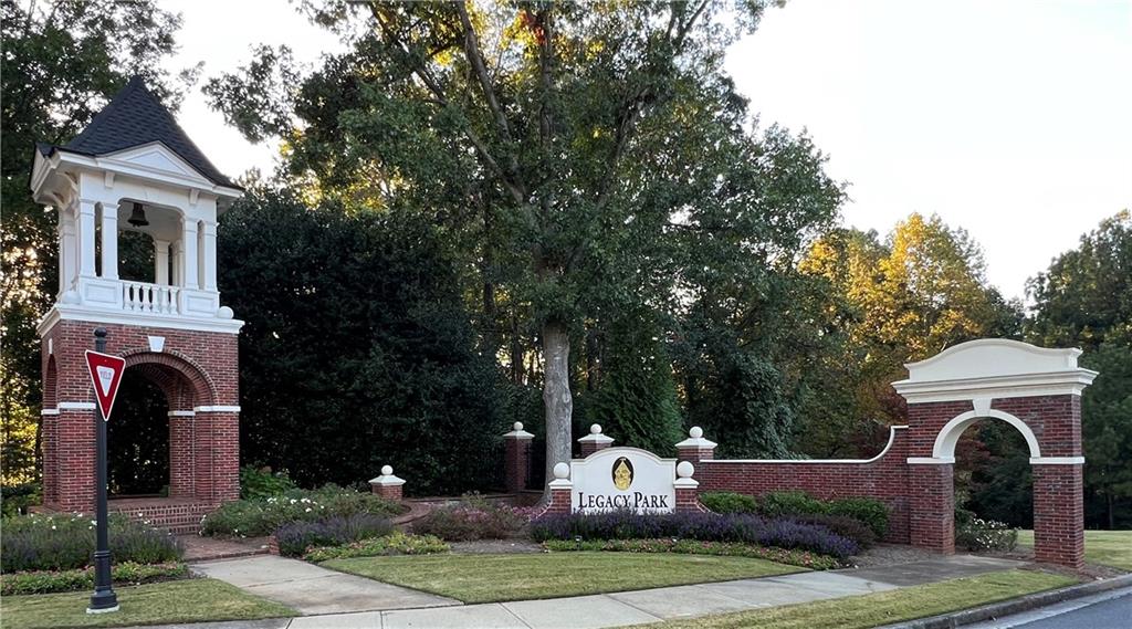 Undisclosed Address Kennesaw, GA 30144 - Photo 49 of 51 a front view of a house with garden