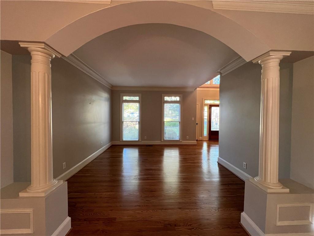 Undisclosed Address Kennesaw, GA 30144 - Photo 6 of 51 a view of empty room with wooden floor and fan