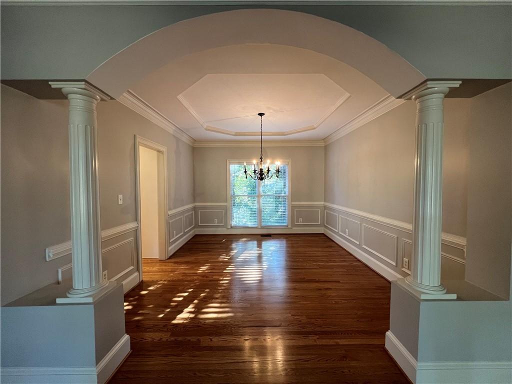 Undisclosed Address Kennesaw, GA 30144 - Photo 7 of 51 a view of an entryway with wooden floor