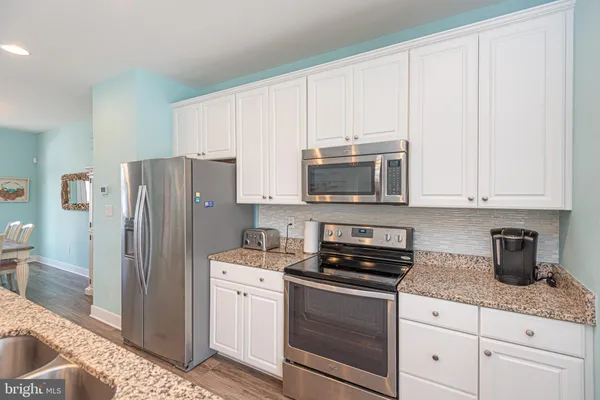 a view of a balcony with chairs