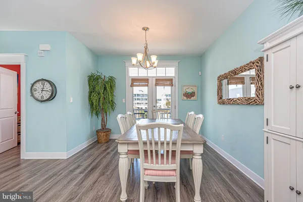 a view of a balcony with lake view and a potted plant