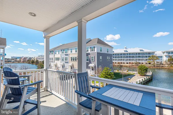 a bathroom with a double vanity sink toilet and shower