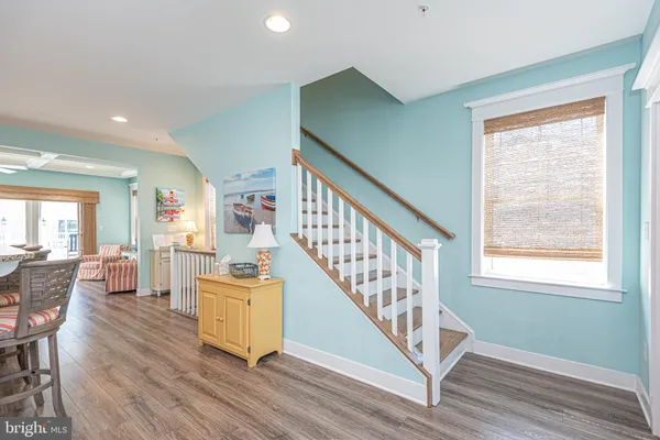 a view of bedroom with a large window and a bed
