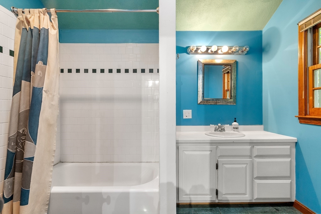 75 Russell Road Wellesley, MA 02482 - Photo 17 of 30 a bathroom with a sink and a mirror