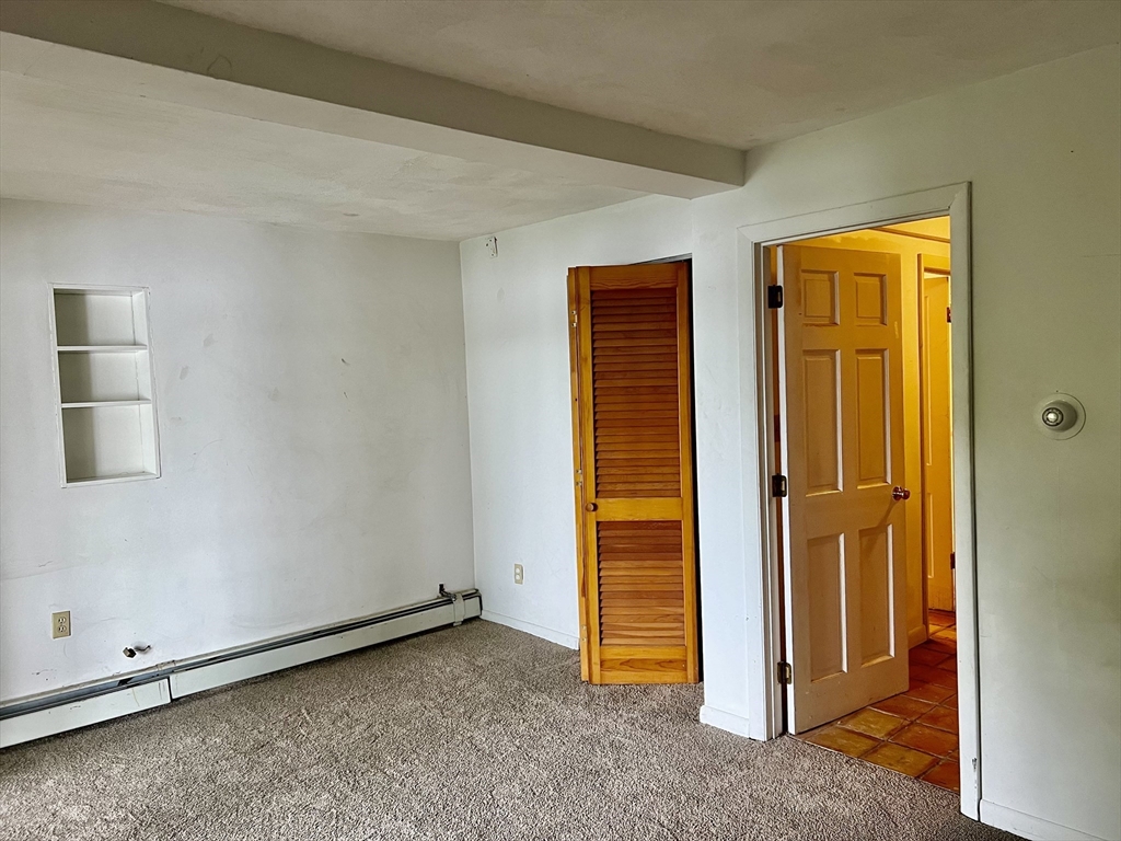 75 Russell Road Wellesley, MA 02482 - Photo 20 of 30 an empty room with closet