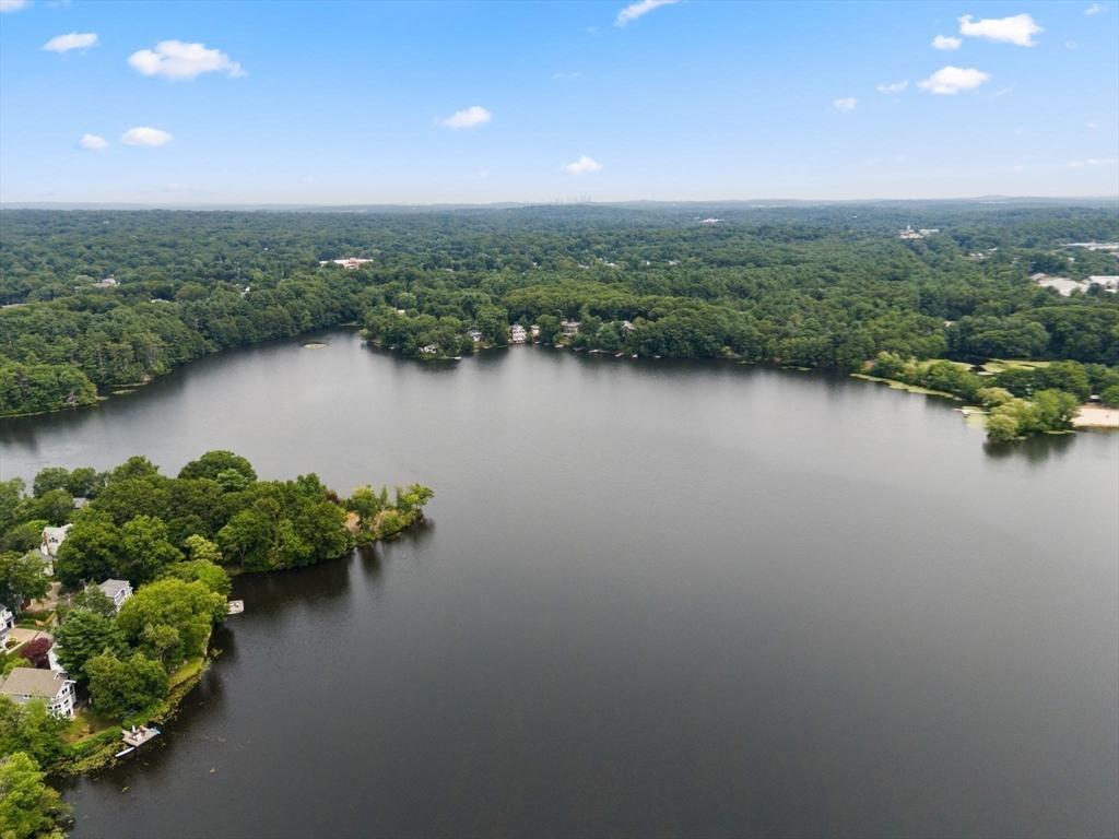 75 Russell Road Wellesley, MA 02482 - Photo 23 of 30 a view of a lake with a city