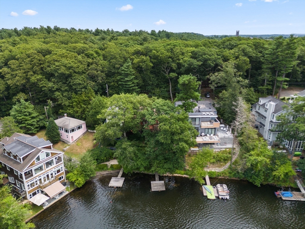 75 Russell Road Wellesley, MA 02482 - Photo 24 of 30 an aerial view of a house with pool outdoor seating and yard