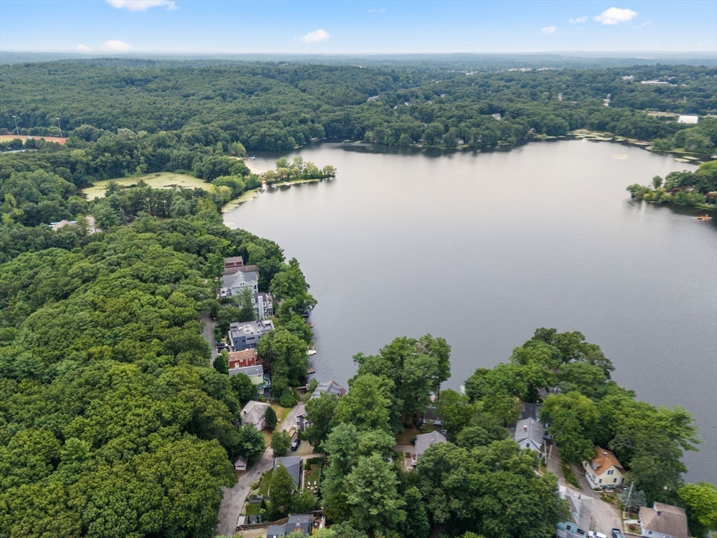 75 Russell Road Wellesley, MA 02482 - Photo 25 of 30 a view of a lake with a city view