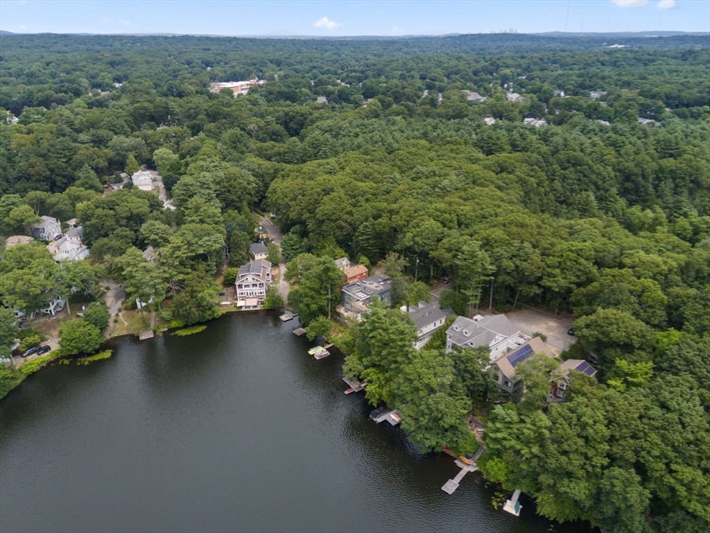 75 Russell Road Wellesley, MA 02482 - Photo 27 of 30 an aerial view of a house with a yard and lake view