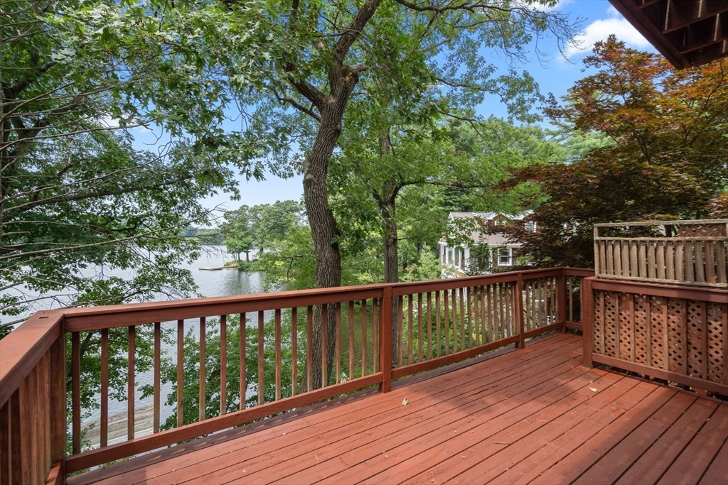 75 Russell Road Wellesley, MA 02482 - Photo 3 of 30 a view of deck with wooden floor and outdoor seating