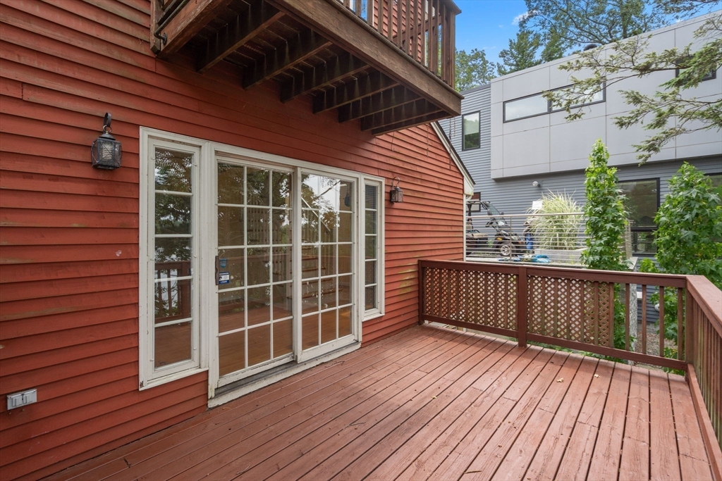 75 Russell Road Wellesley, MA 02482 - Photo 4 of 30 a view of balcony with wooden floor