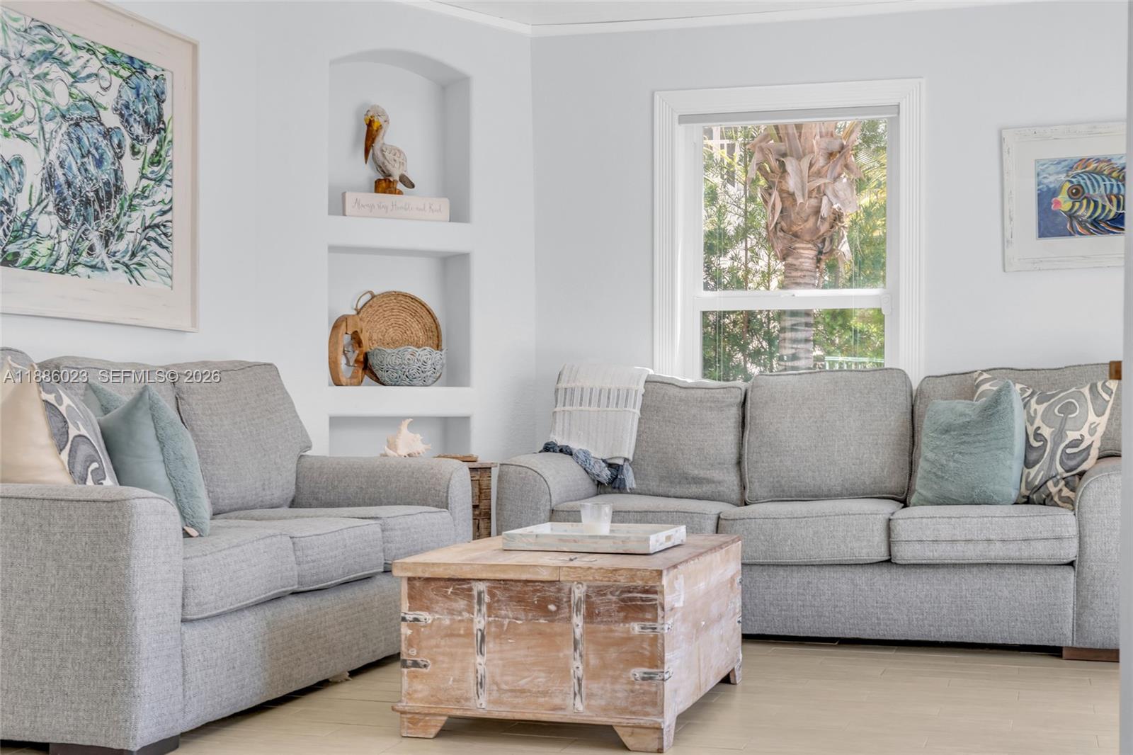511 4th Street Key Colony Beach, FL 33051 - Photo 18 of 41 a living room with furniture and a window