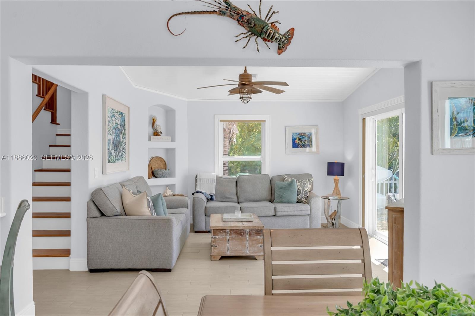 511 4th Street Key Colony Beach, FL 33051 - Photo 19 of 41 a living room with furniture and a large window