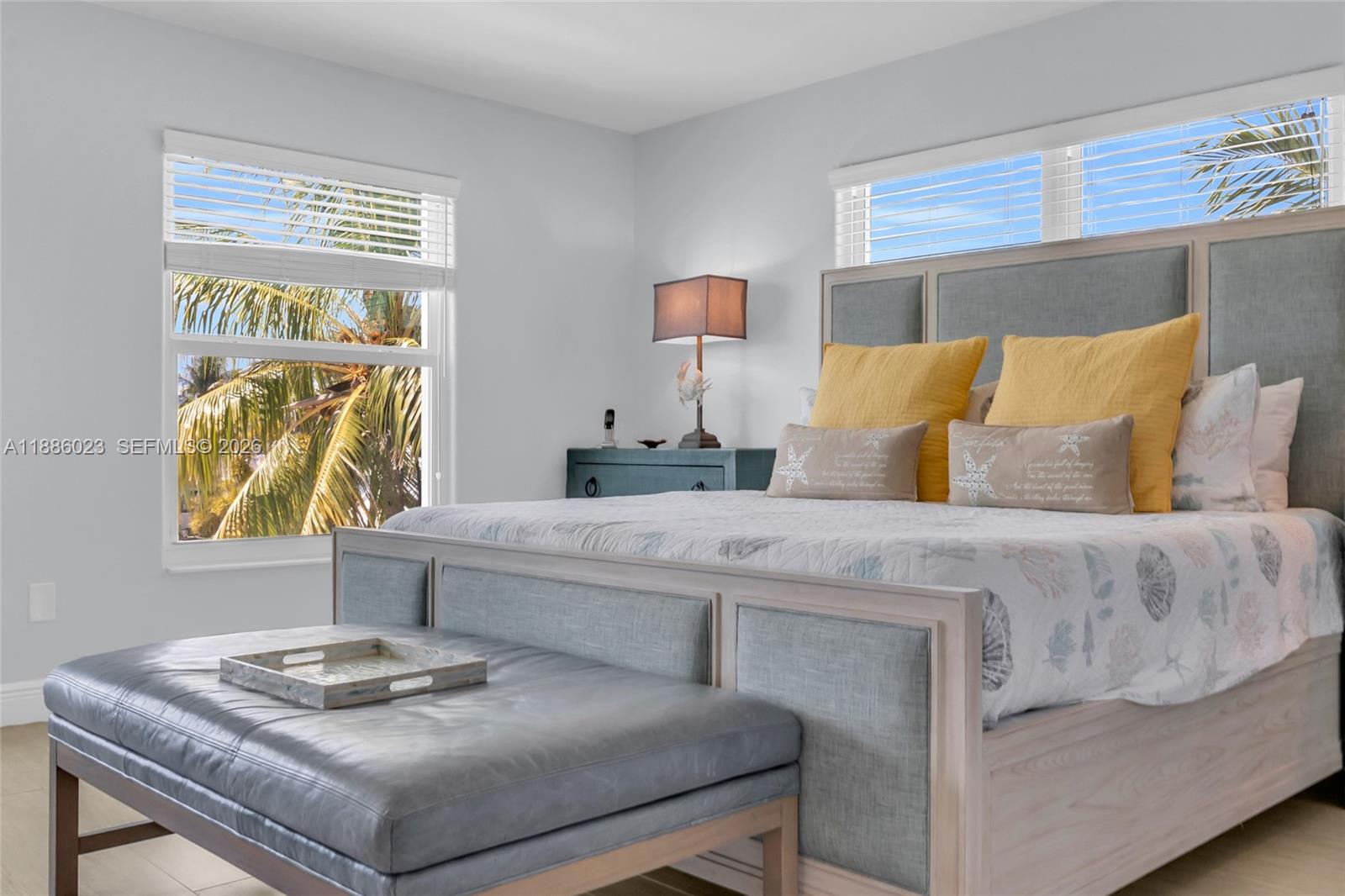 511 4th Street Key Colony Beach, FL 33051 - Photo 23 of 41 a bedroom with a bed and couch