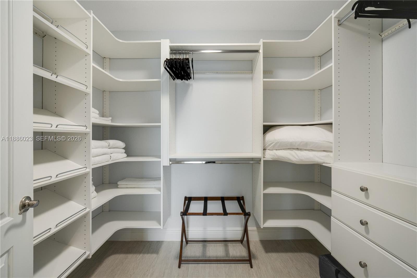 511 4th Street Key Colony Beach, FL 33051 - Photo 26 of 41 a view of walk in closet with empty racks
