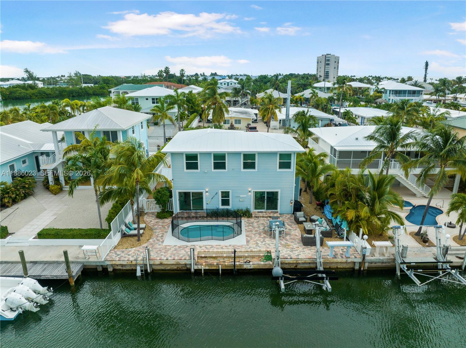 511 4th Street Key Colony Beach, FL 33051 - Photo 33 of 41 a view of a lake with a city