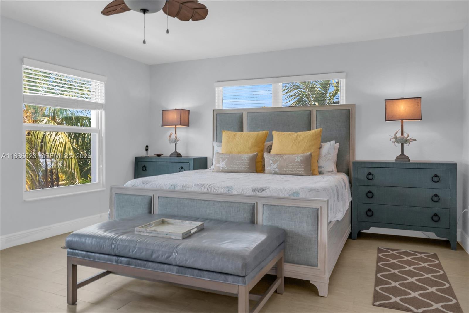 511 4th Street Key Colony Beach, FL 33051 - Photo 6 of 41 a bedroom with a bed and a dresser