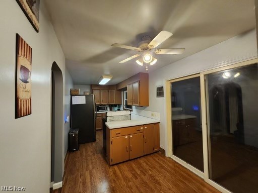 3205 Center Road Ashtabula, OH 44004 - Photo 7 of 29 Kitchen with dark wood-type flooring, appliances with stainless steel finishes, and ceiling fan