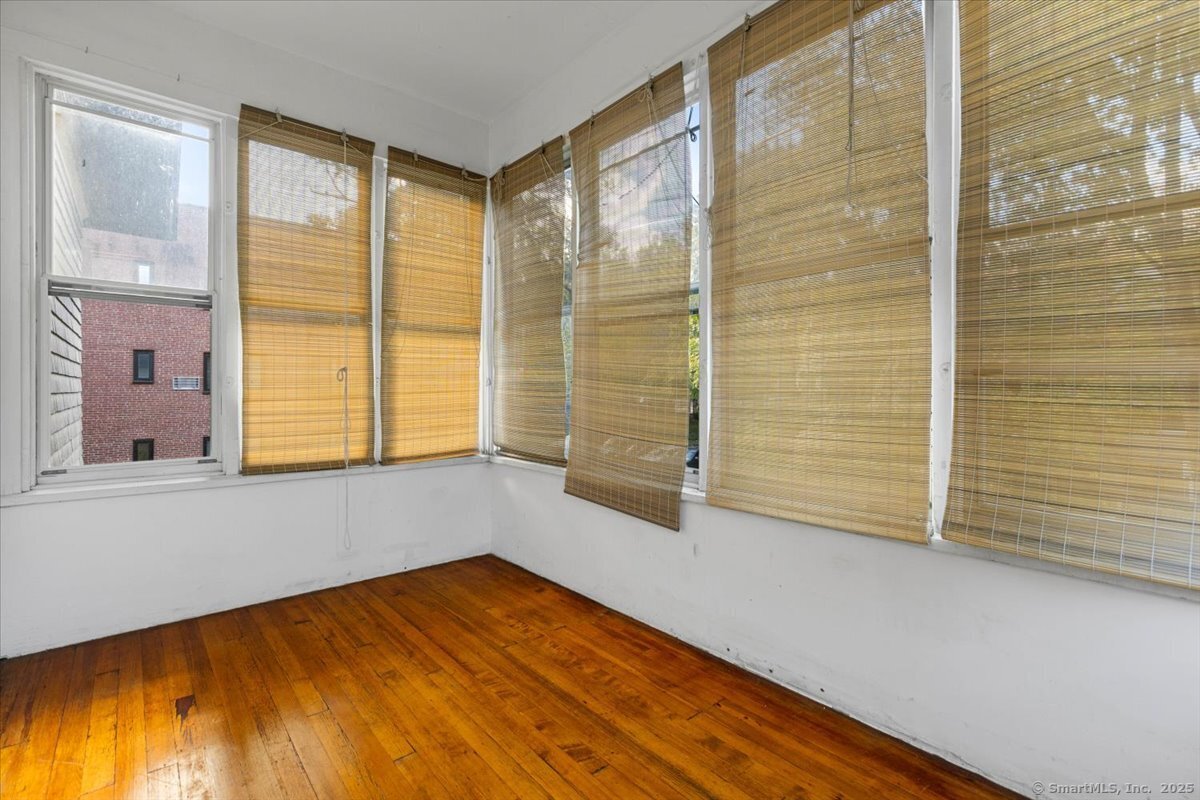 590 Whitney Avenue, Unit 2 New Haven, CT 06511 - Photo 11 of 18 a view of an empty room with a window