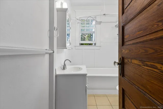 a bathroom with a sink and a bathtub